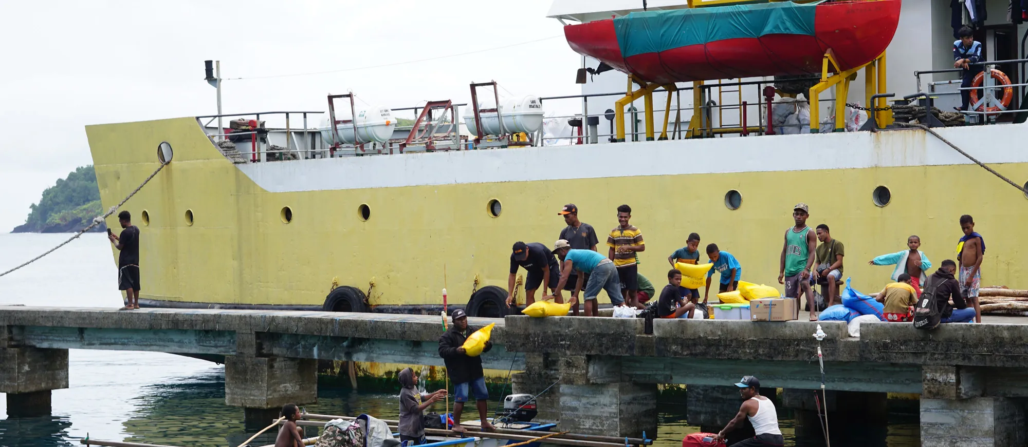 An inter-island boat loaded with passengers and cargo